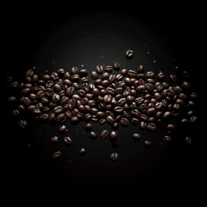 Dark roasted coffee beans scattered on a black background with dramatic lighting.