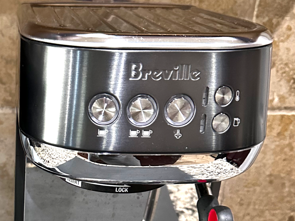 Close up on Breville Bambino Plus buttons