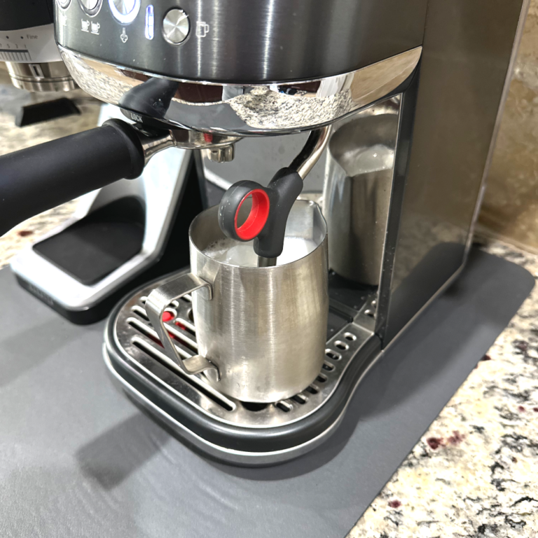 Breville Bambini plus steam function with pitcher of milk